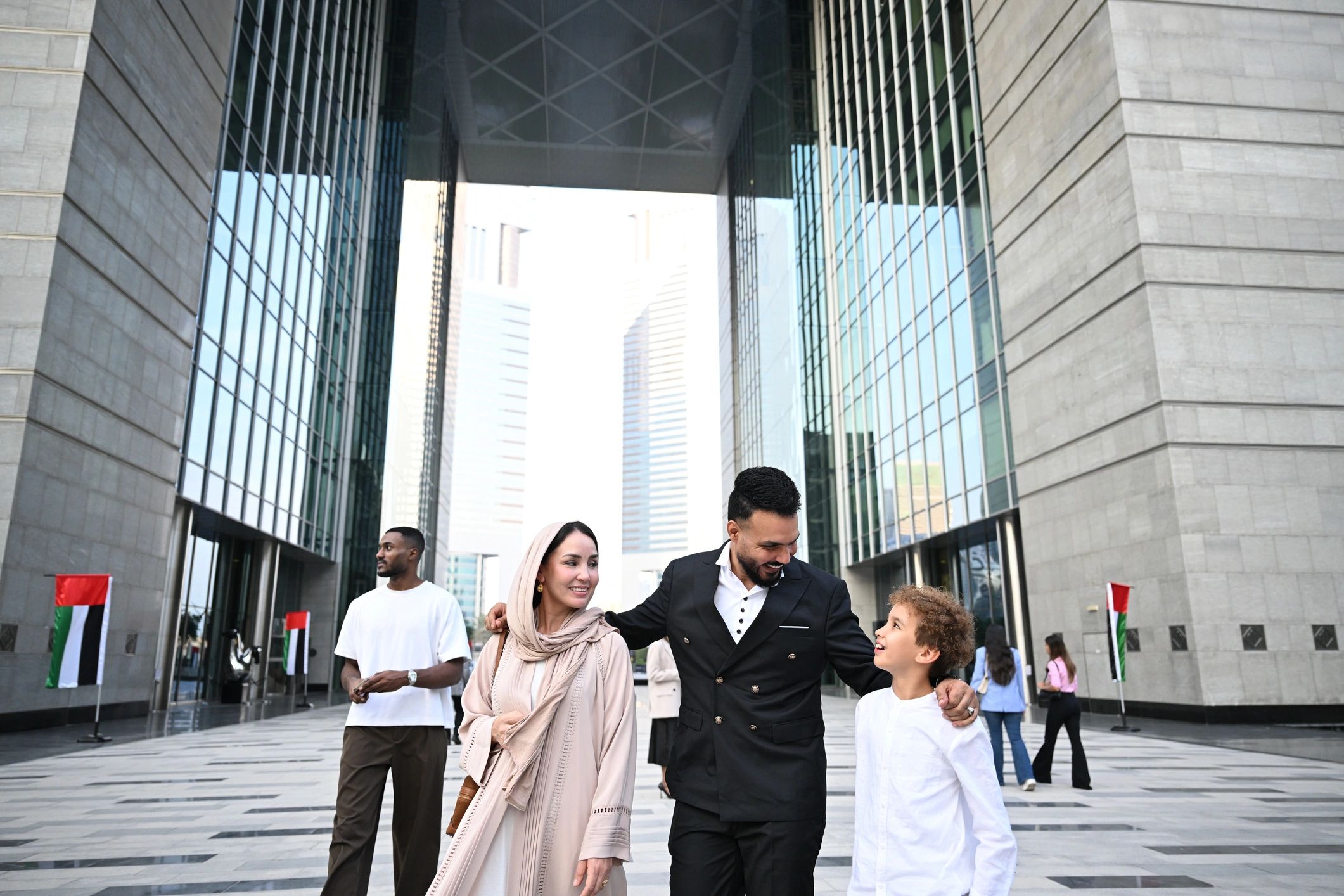 Family exploring modern Dubai architecture together