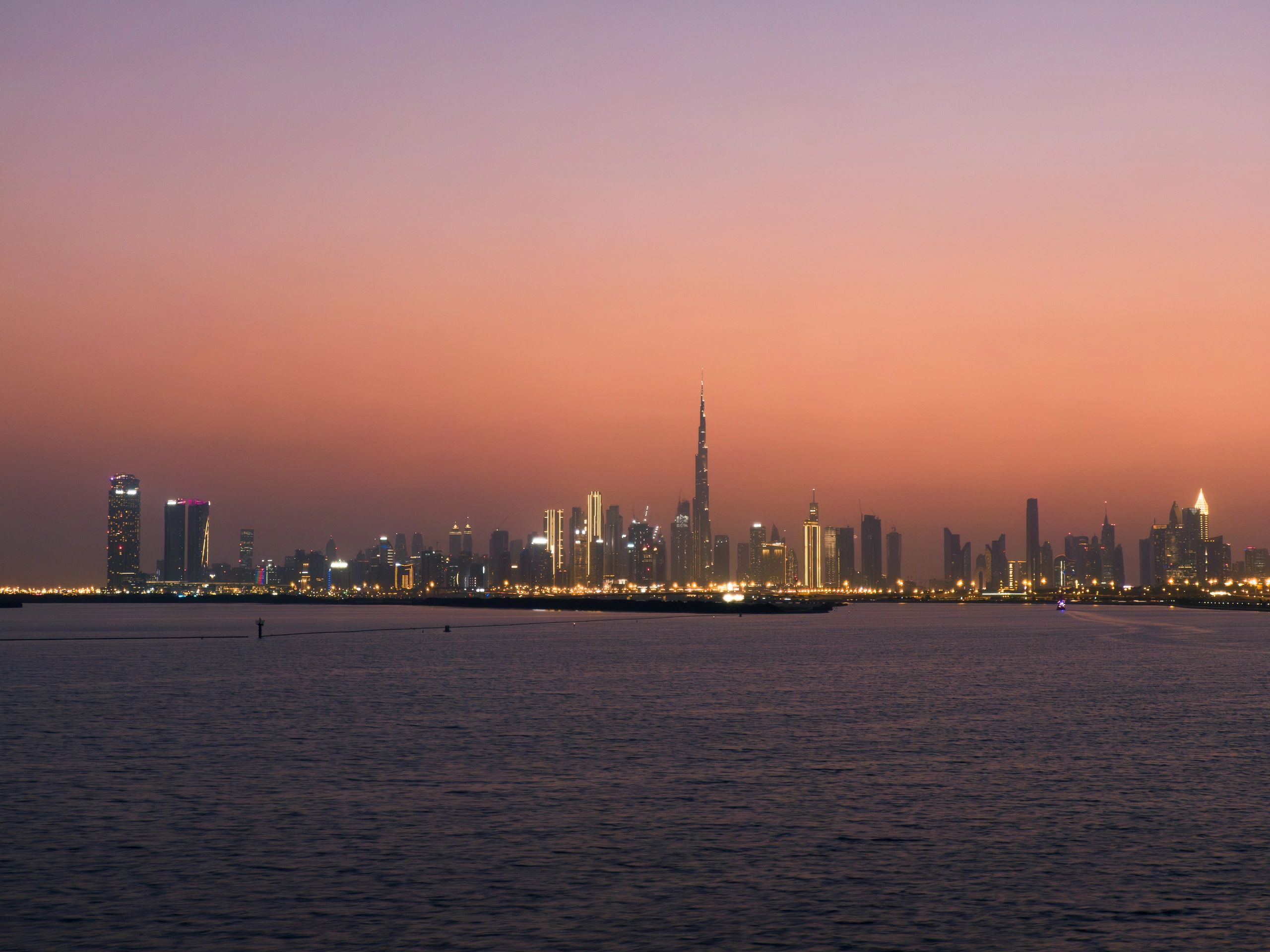 Dubai skyline and Burj Khalifa at sunset